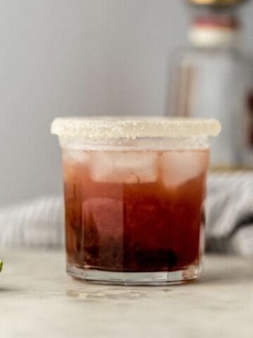 side view of margarita in sugar rimmed glass.