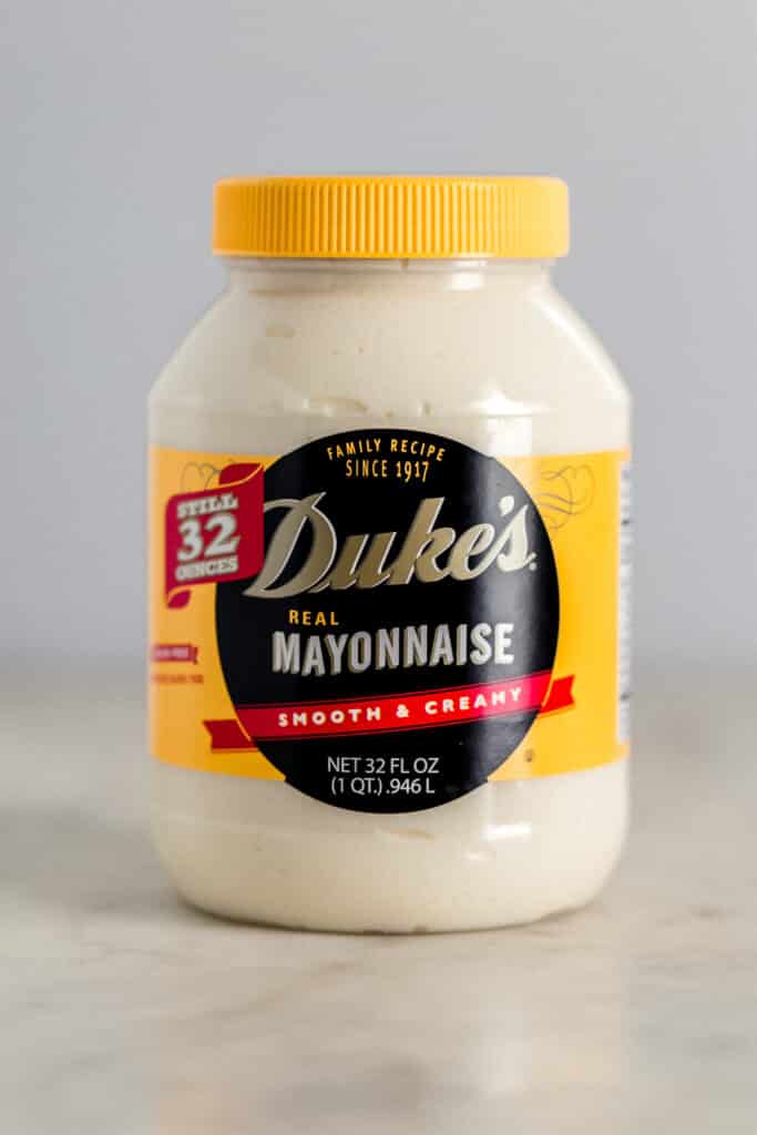 close up side view jar of duke's mayo. 