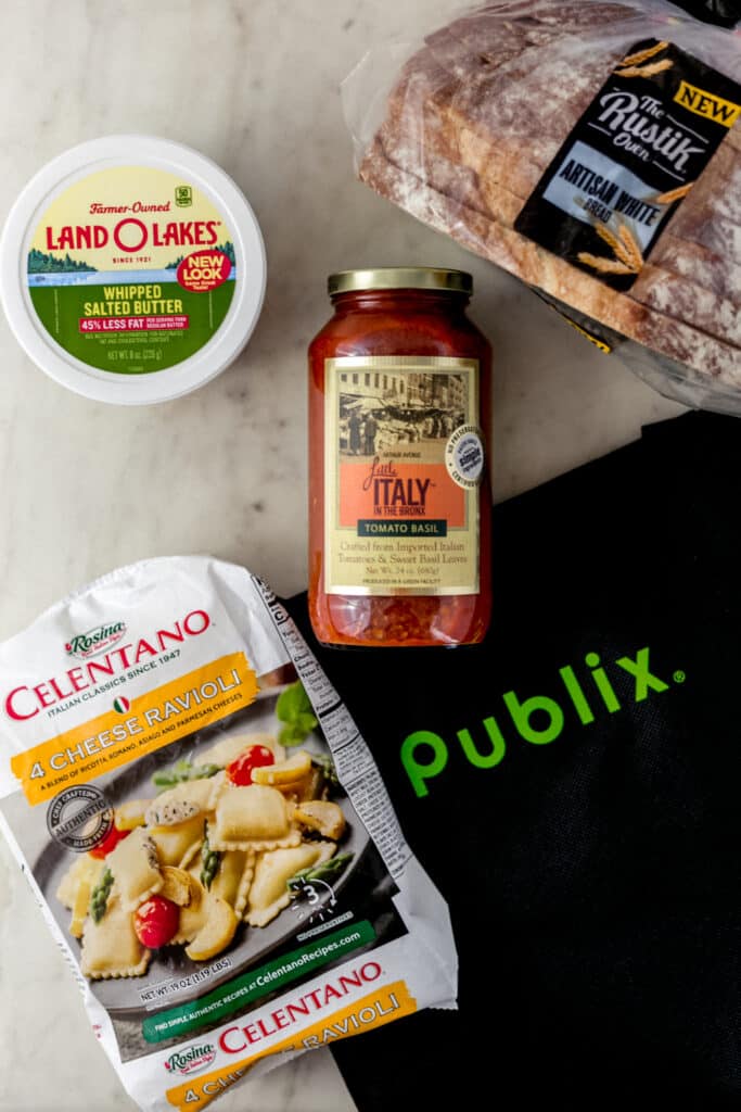 Publix shopping bag with items for the Everyday Delicious promotion.