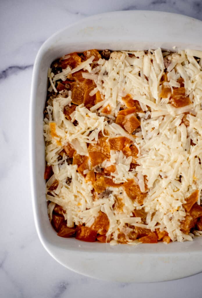square white baking dish with unbaked ingredients. 