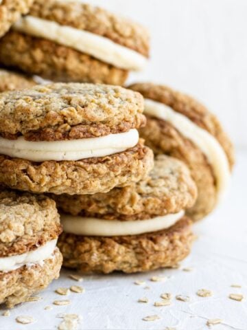 Close up view of pies stacked on each other.