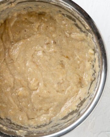 Overhead view of muffins batter in mixing bowl.