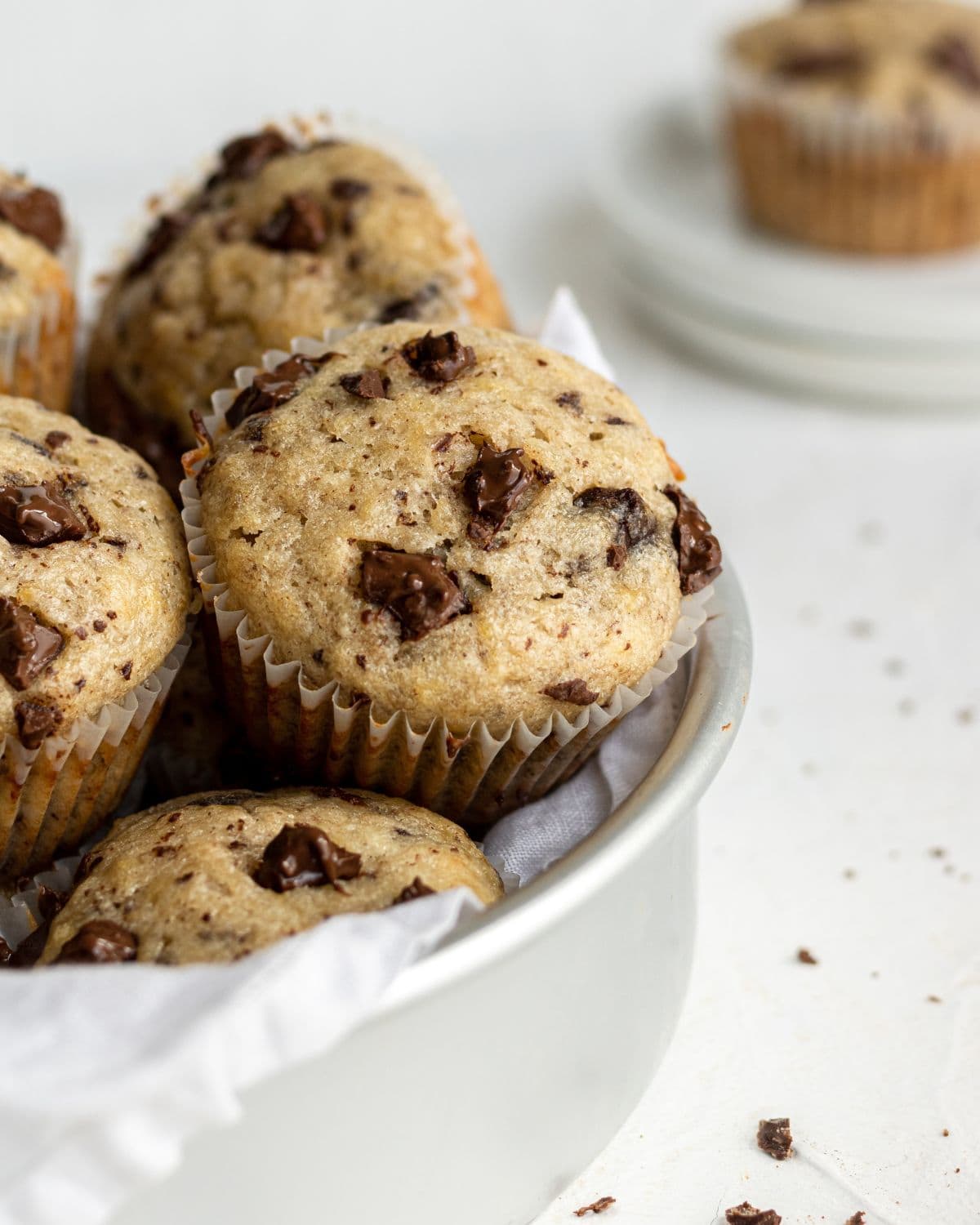 Close up side view of finished muffins in baking pan. 
