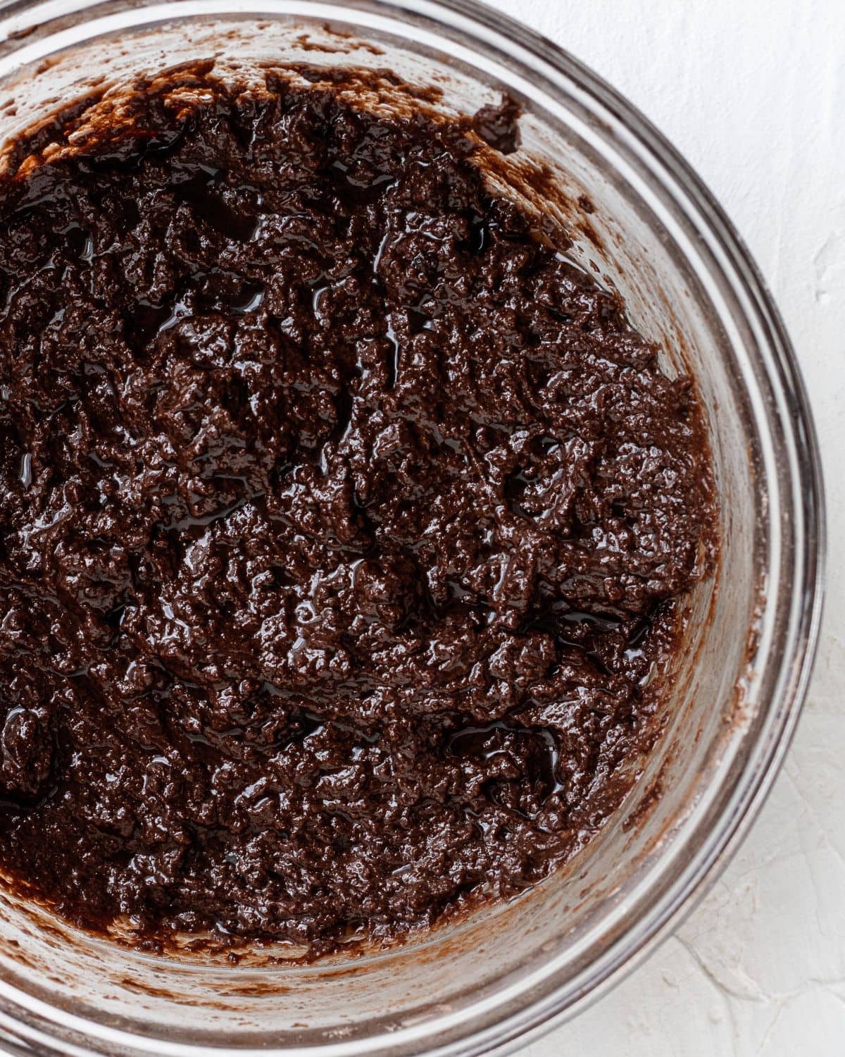 Mixing bowl with brownie batter in it.