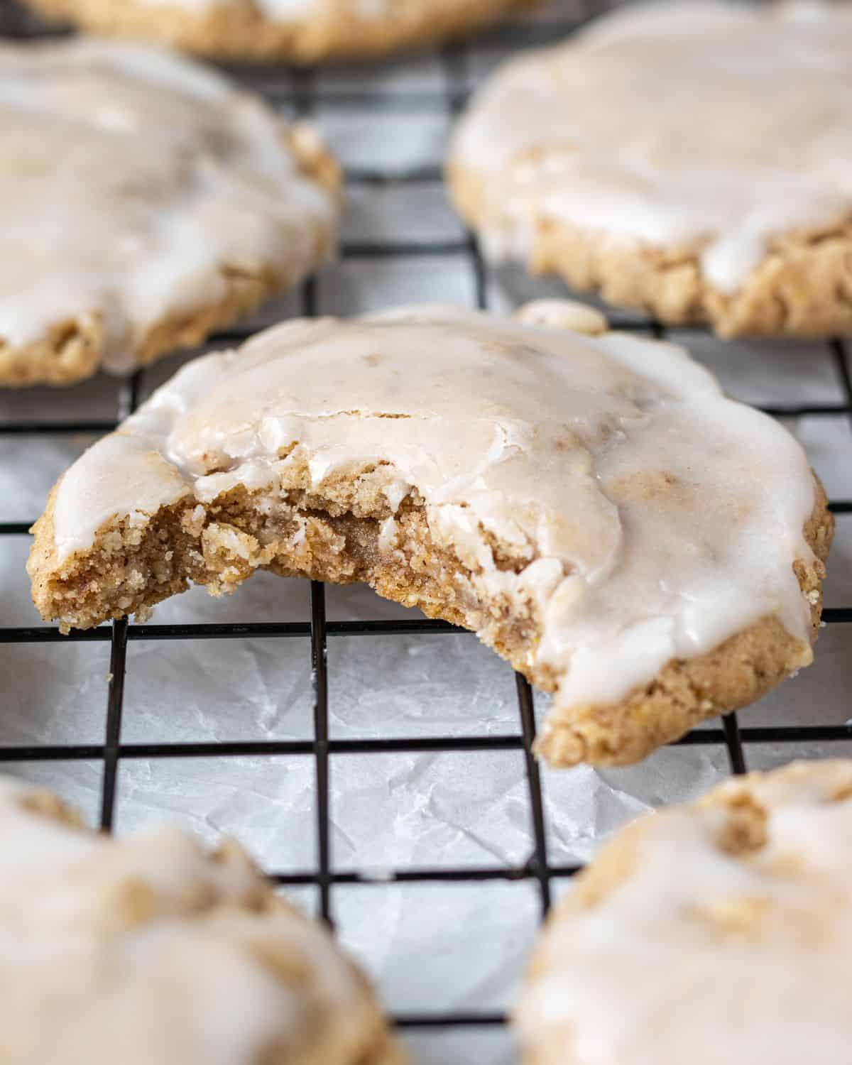 Close up view of cookie with a bite in it. 