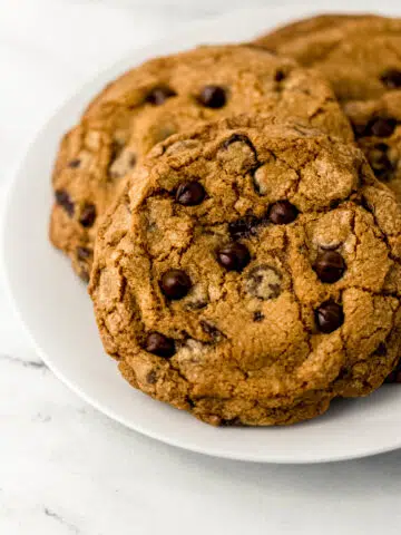 chocolate chip cookie on white plate