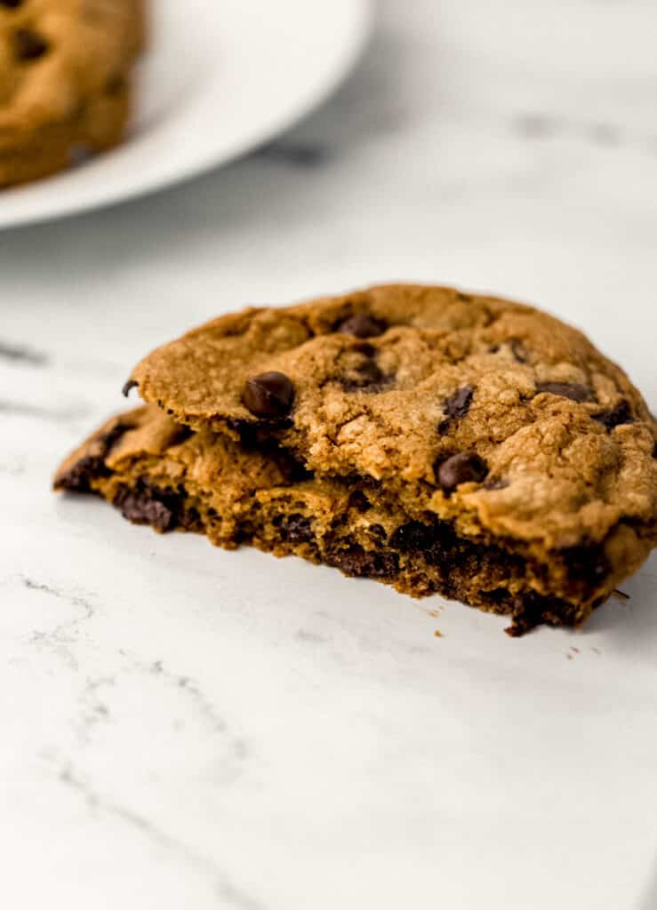 large cookie cut in half on marble surface