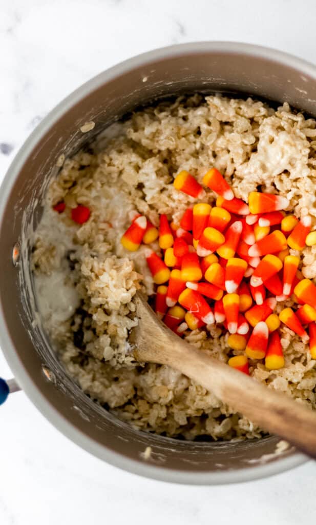 candy corn in rice krispie treat mixture 