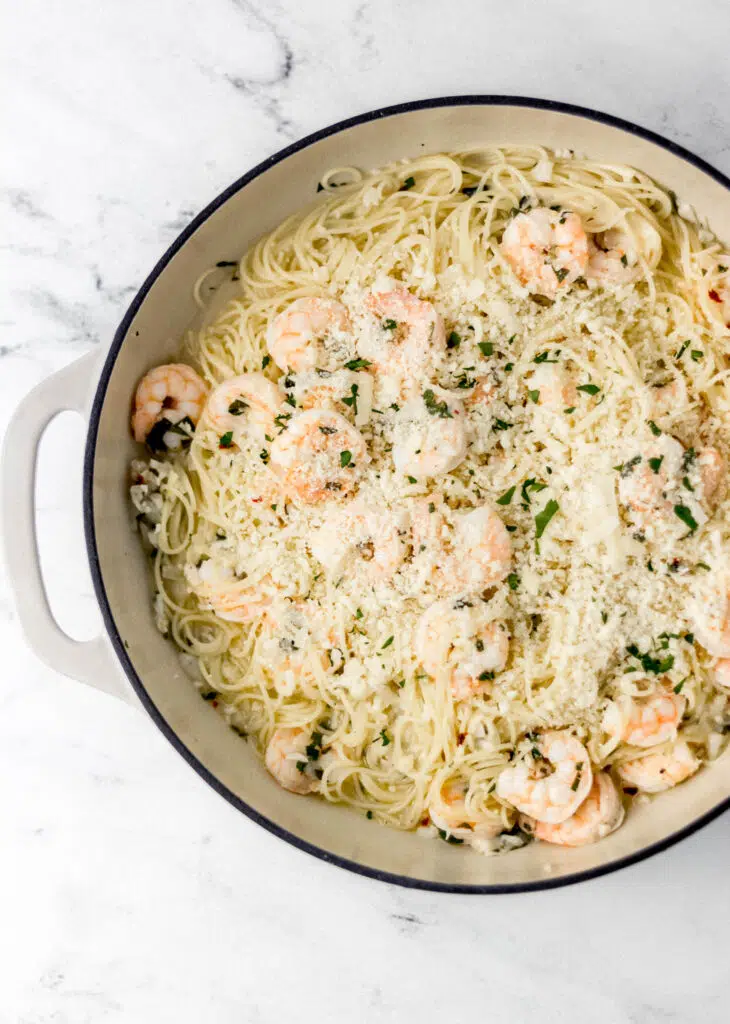 finished shrimp scampi pasta topped with parmesan cheese
