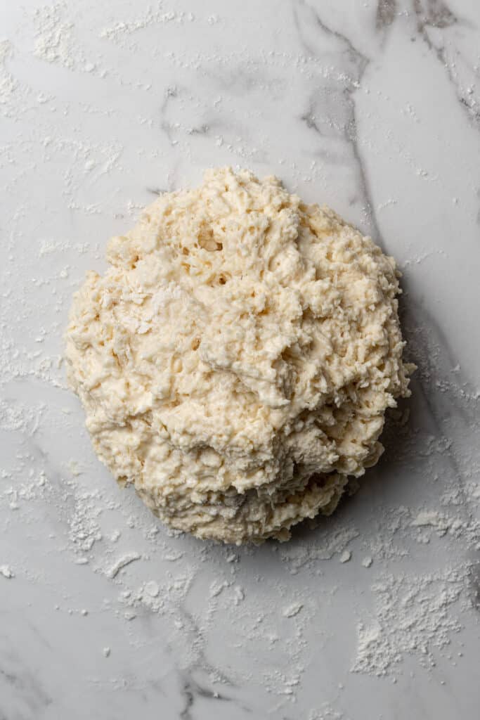biscuit dough on lightly floured marble surface