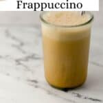 Side view of coffee in glass with straw on pin with text overlay.