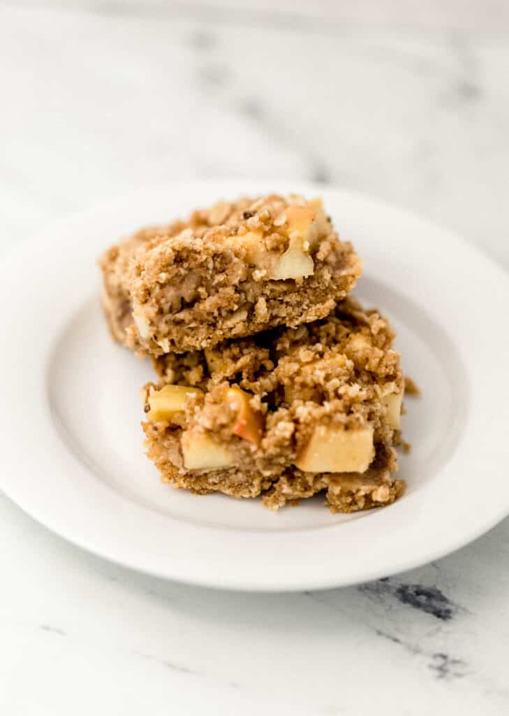 two apple bars on a white plate 