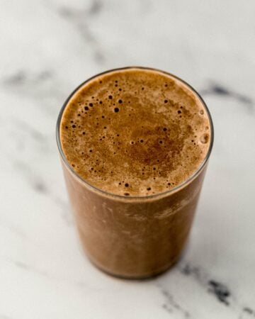 Finished smoothie in a glass.