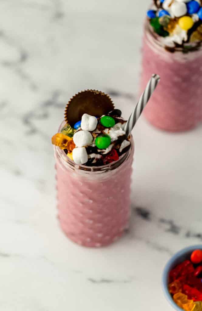 freakshake in glass with straw in it