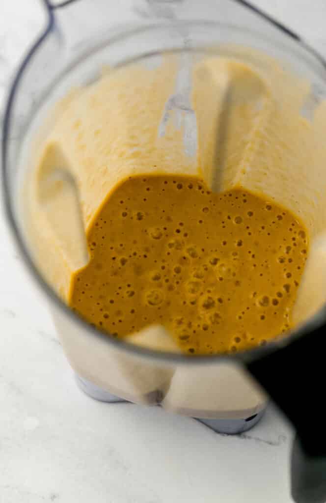 ginger dressing ingredients blended in blender pitcher 