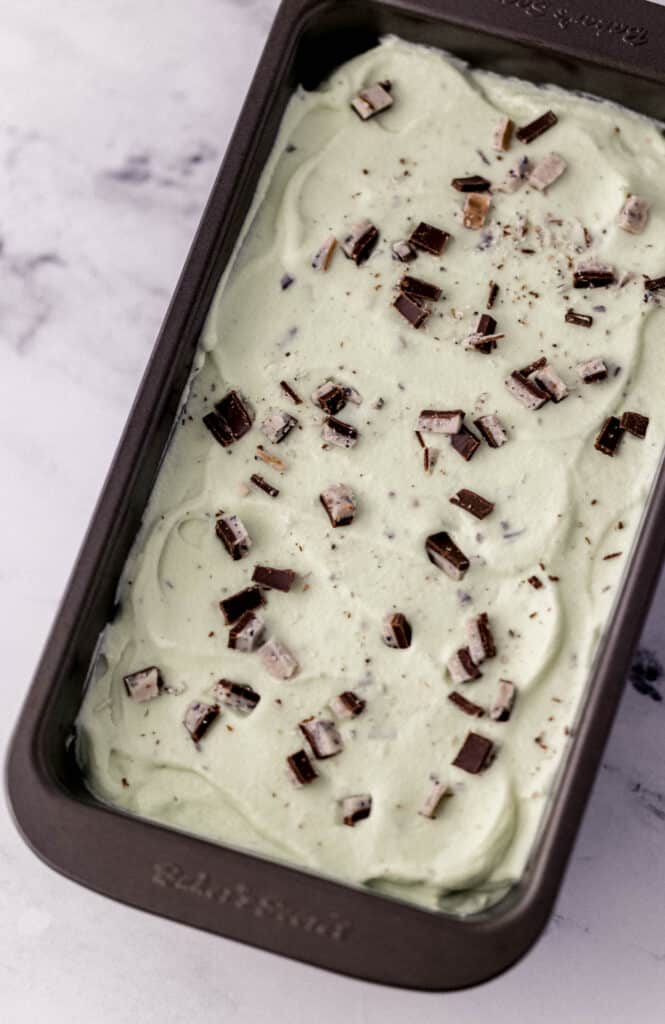 ice cream in a loaf pan before placing into the freezer to set.