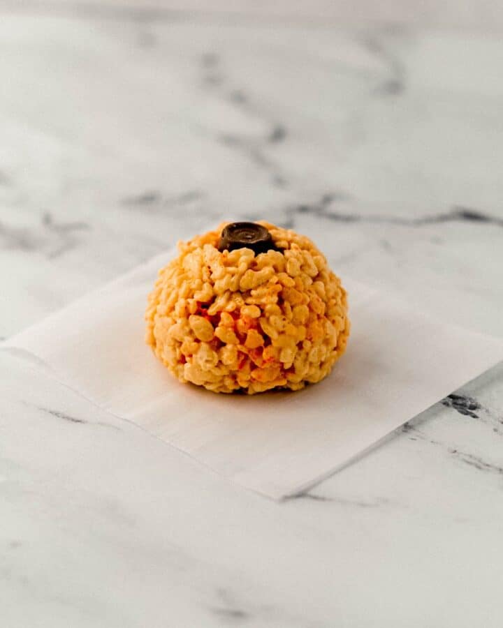 Rolo candy added to rice krispie treat ball.