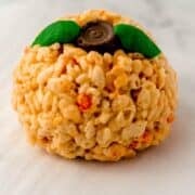 Close up view of finished rice krispie treat on pin with text overlay.