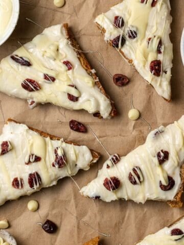 Overhead view of finished bliss bars on brown paper surface.