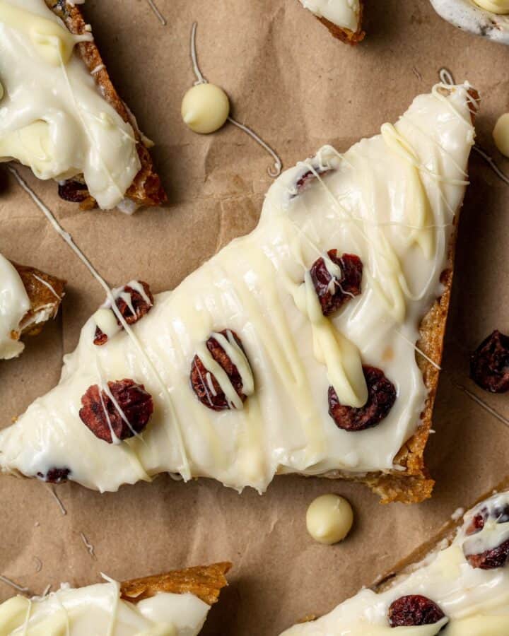 Close up view of finished cranberry bliss bar. 