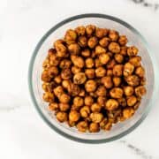 Glass bowl with finished chickpeas in it.