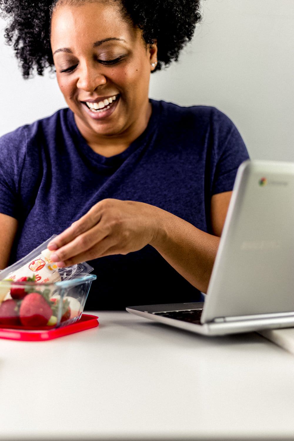 lakita at her laptop having breakfast