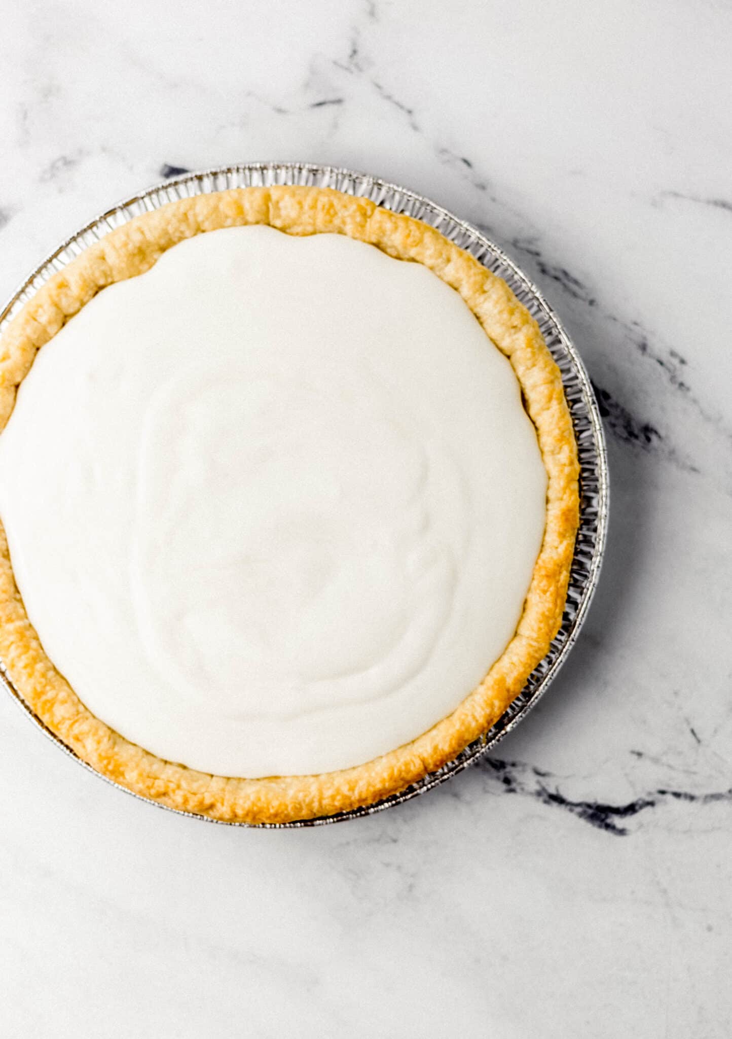 pie filling added to baked pie crust before placing in the refrigerator 