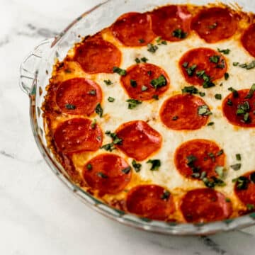 close up side view of dip in glass dish