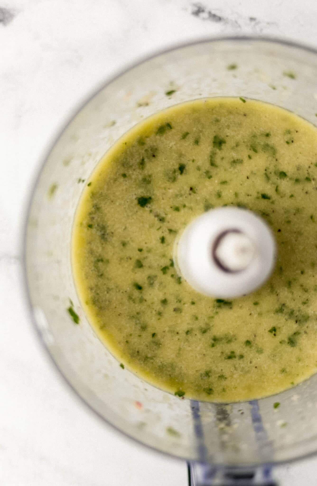 greek potato sauce ingredients combined in food processor