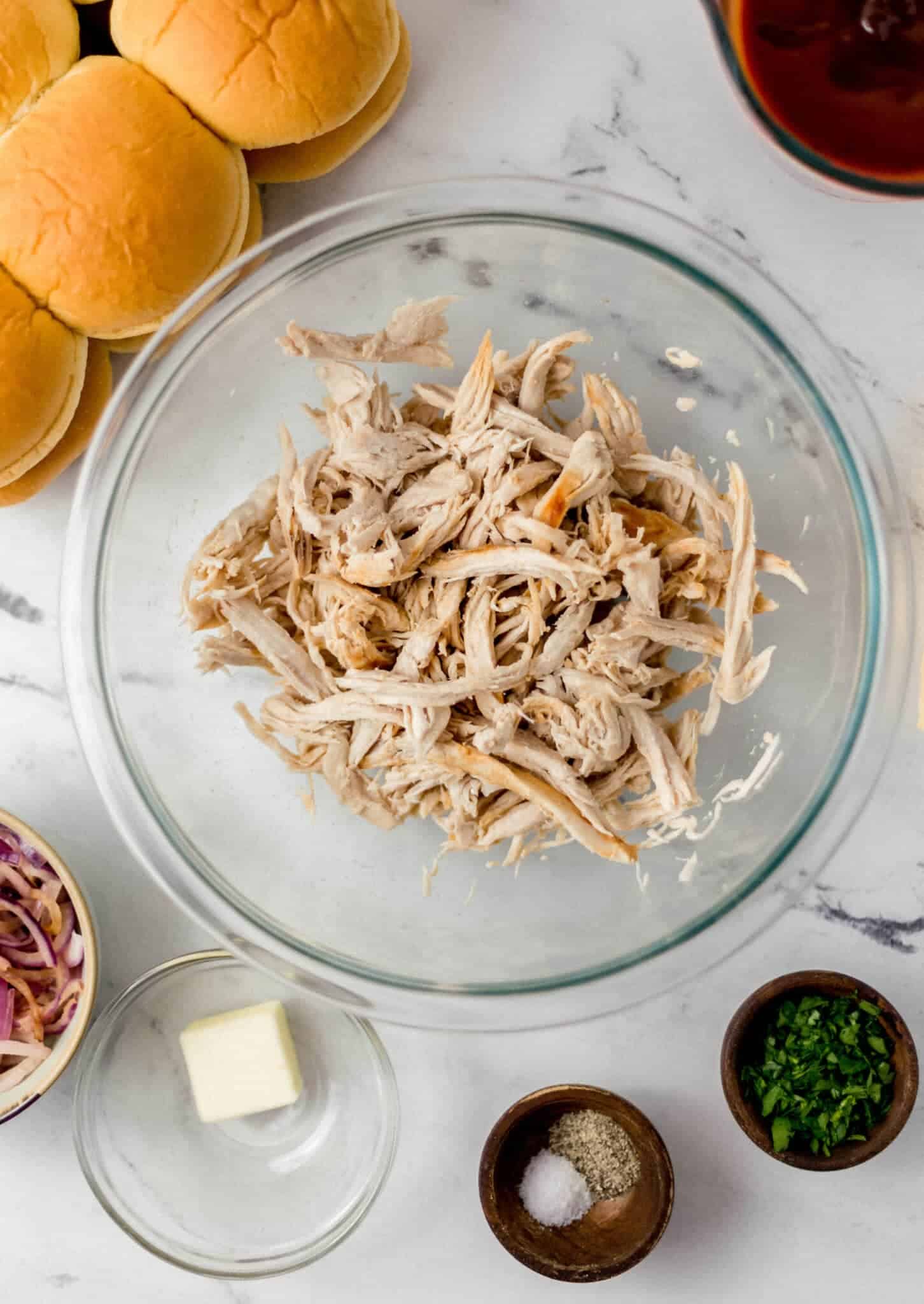 ingredients needed to make chicken sliders in separate bowls 