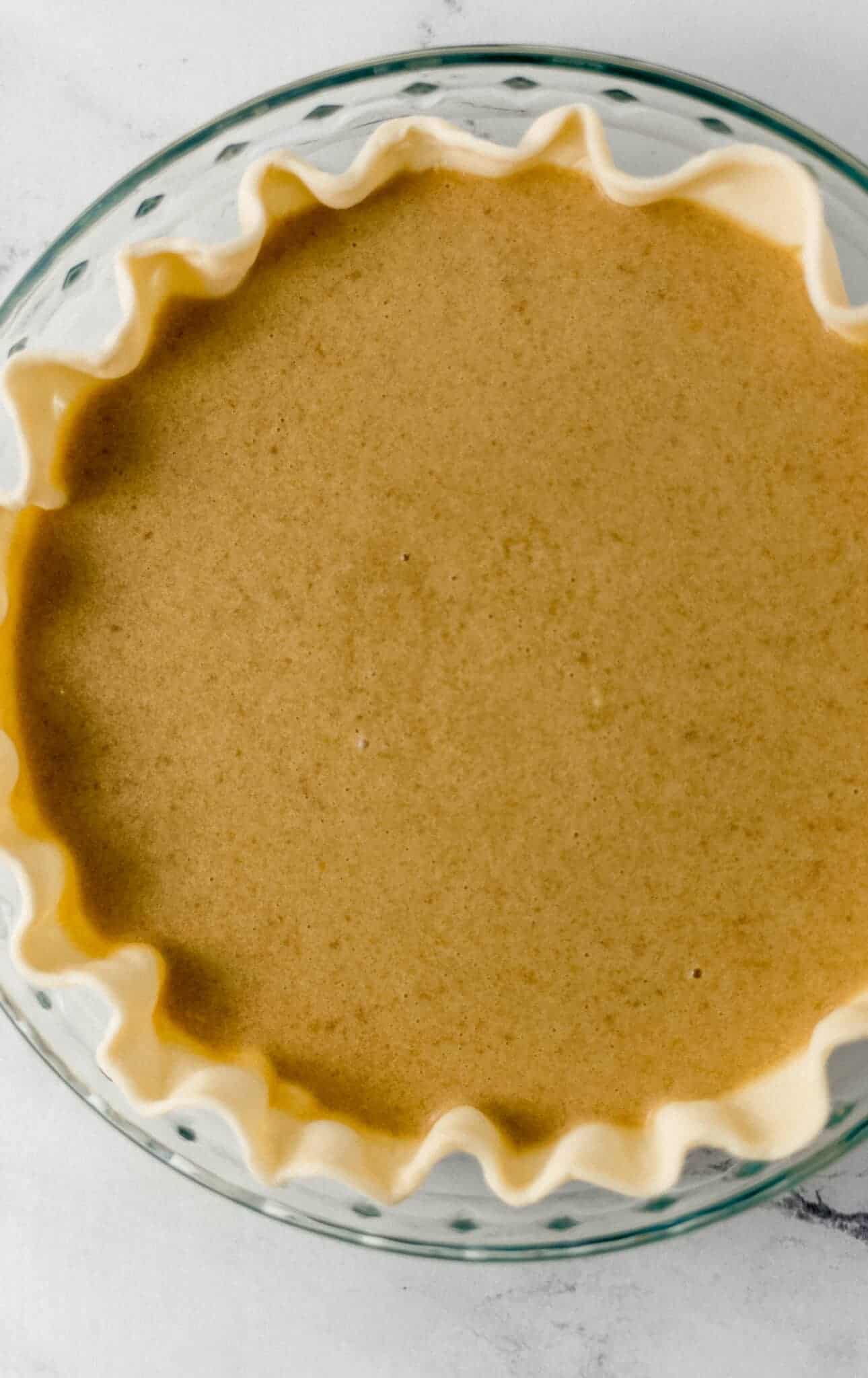 pie mixture added to unbaked pie crust 