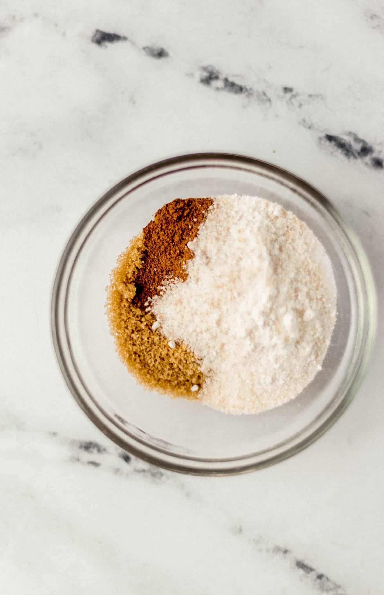 cinnamon, brown sugar, and flour in small glass bowl 