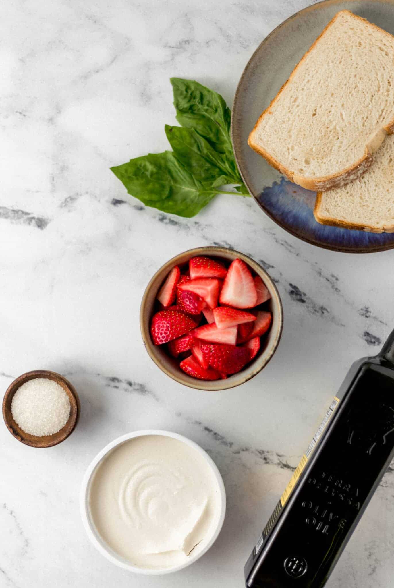 ingredients needed to make toast on marble surface 