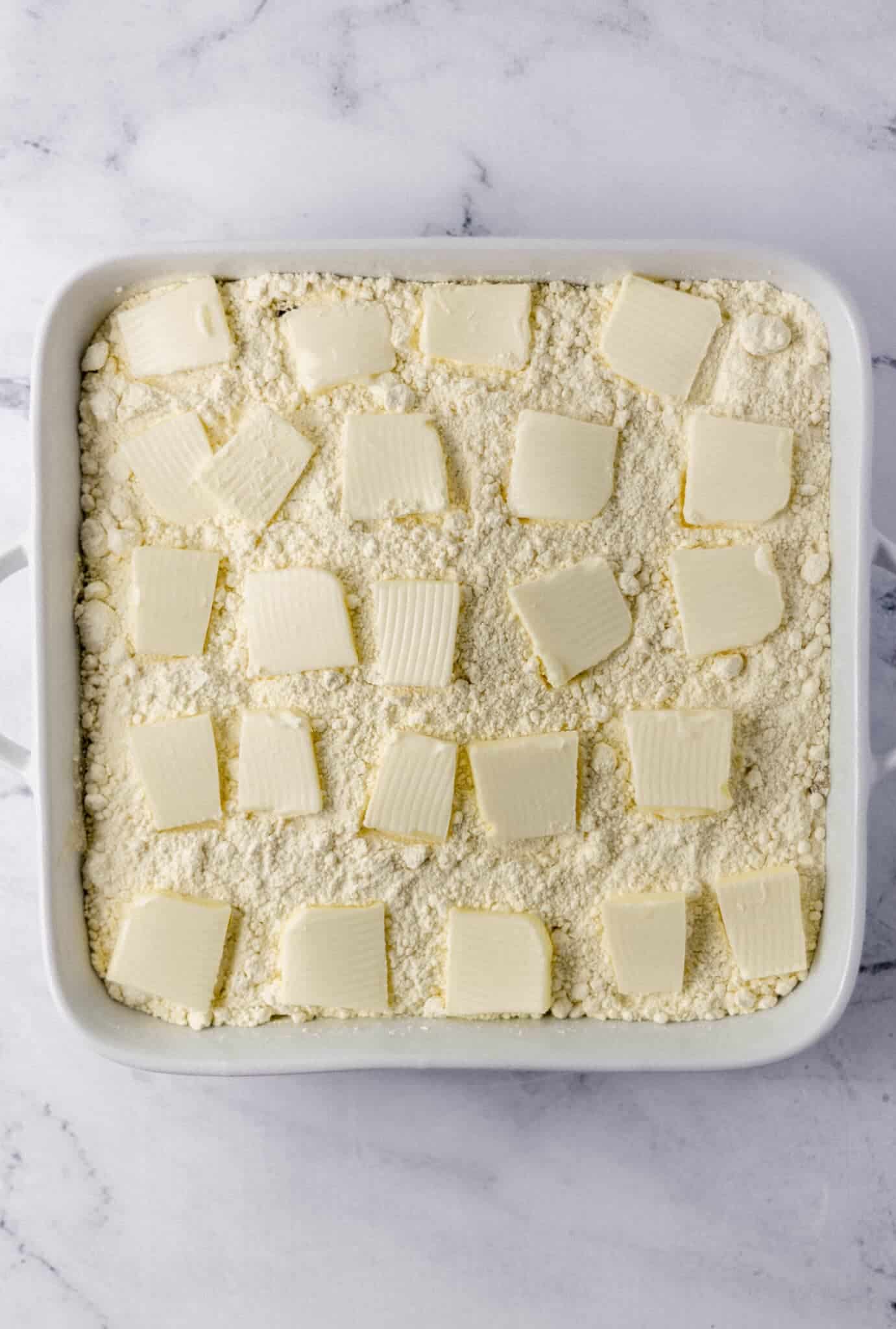 butter placed on top of cake mix