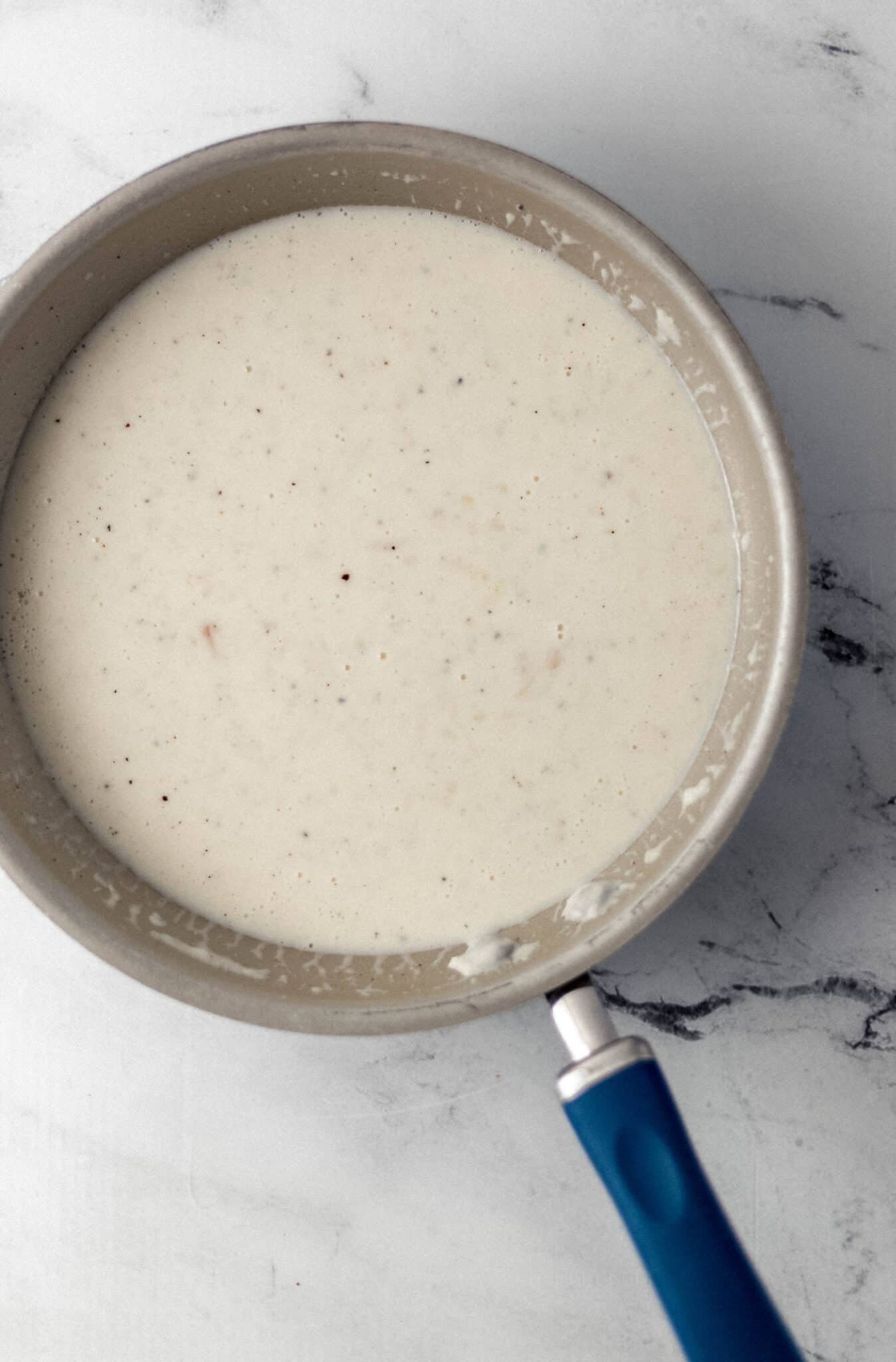 ingredients to make white sauce combined in large skillet 