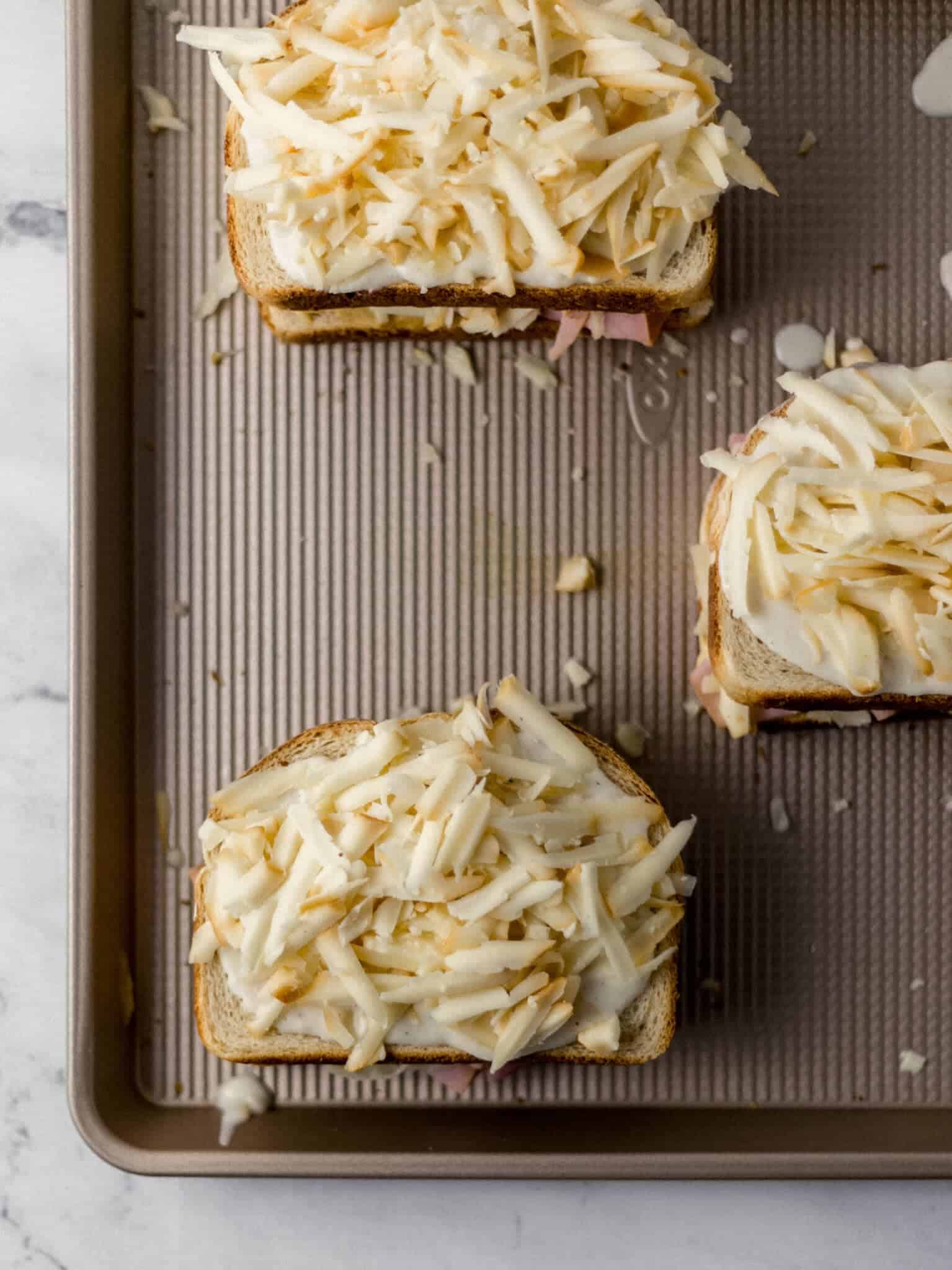 sandwiches assembled on sheet pan before placing under the broiler 