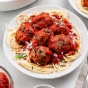 Close up view of plate of spaghetti and meatballs.