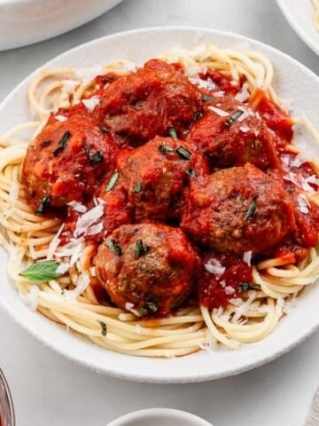Close up view of plate of spaghetti and meatballs.