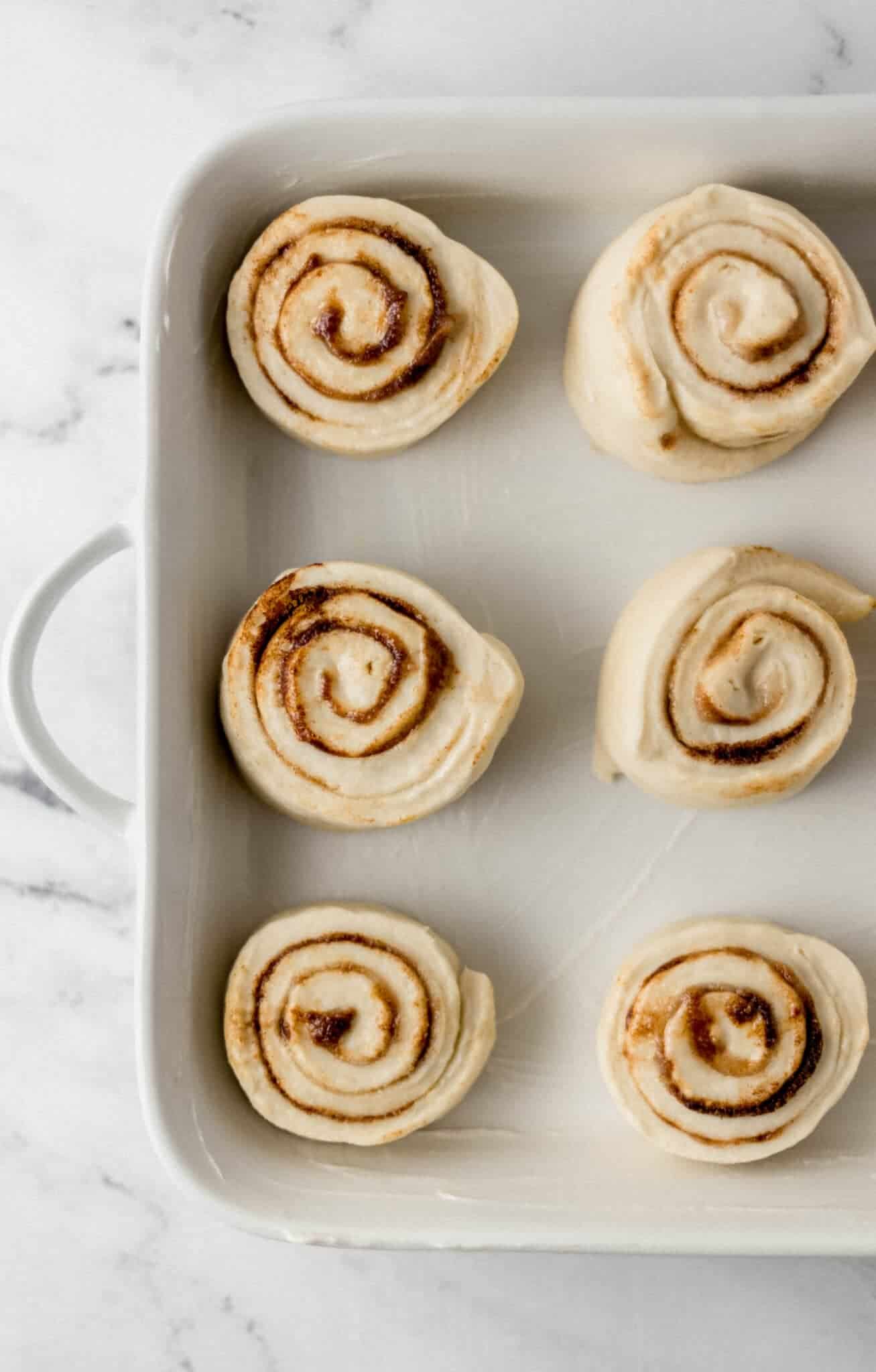 cut rolls in prepared baking dish 