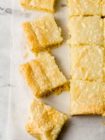 overhead view of cut chess squares on parchment paper