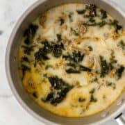 Overhead view of finished soup in a saucepan.