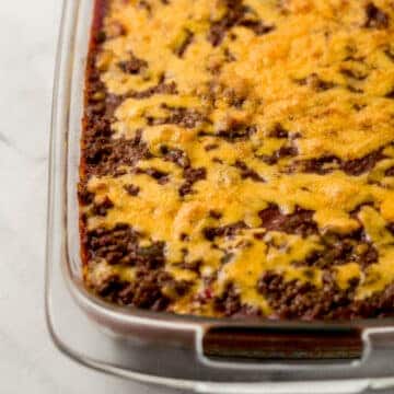 finished sloppy joe cornbread casserole in rectangle glass baking dish