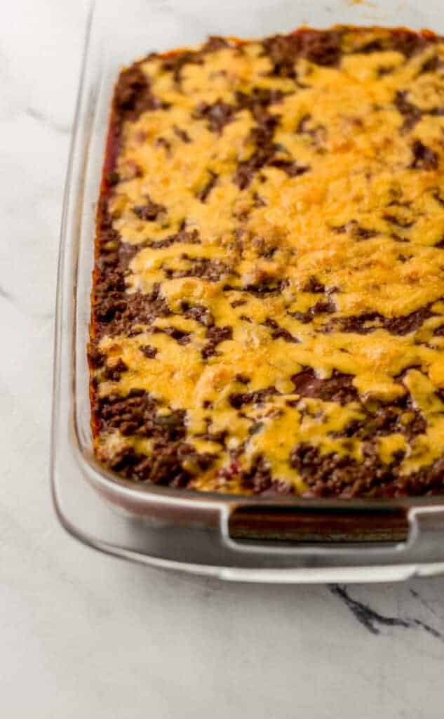 finished sloppy joe cornbread casserole in rectangle glass baking dish