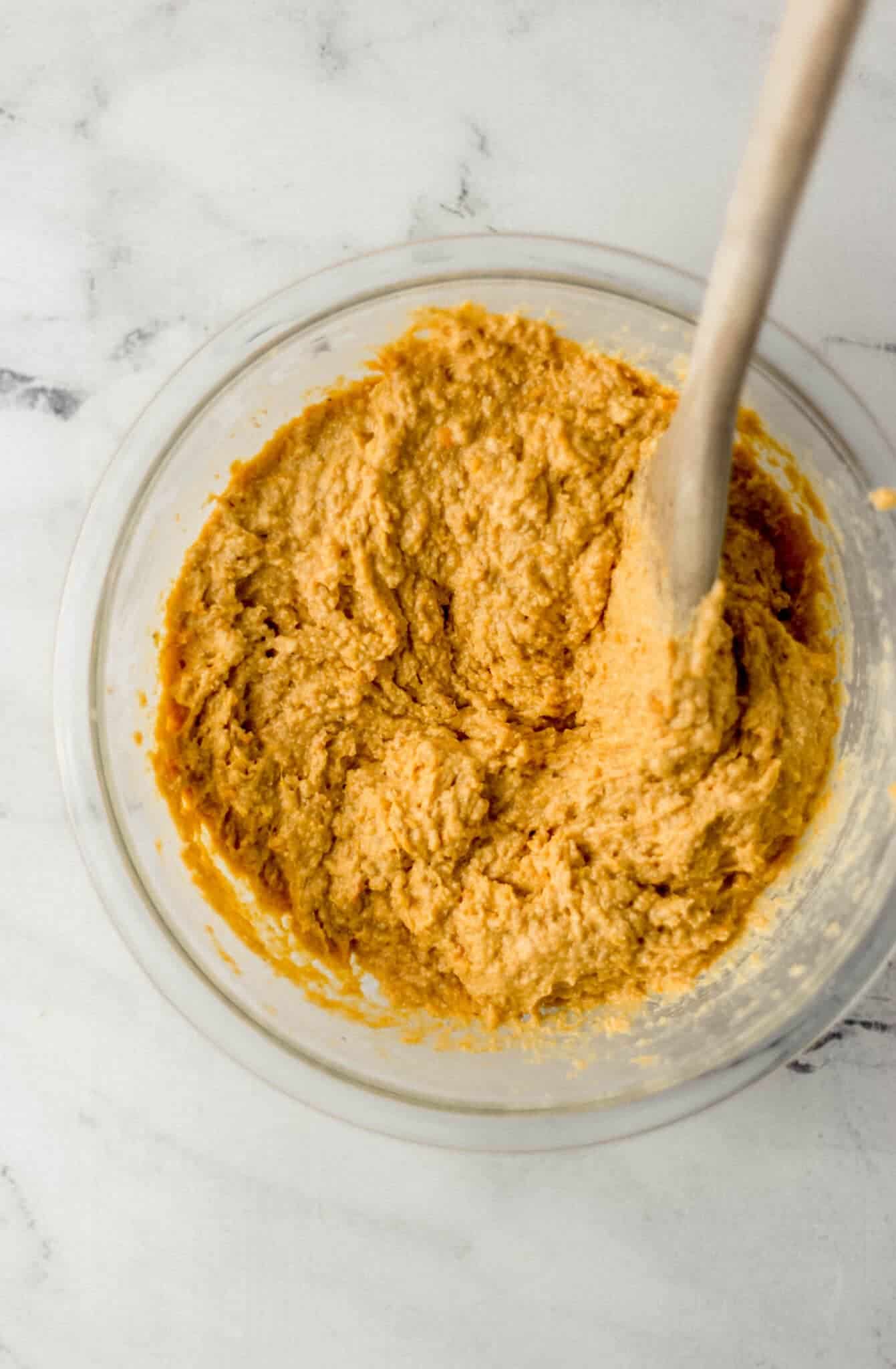 all ingredients combined in large glass mixing bowl to make cornbread 