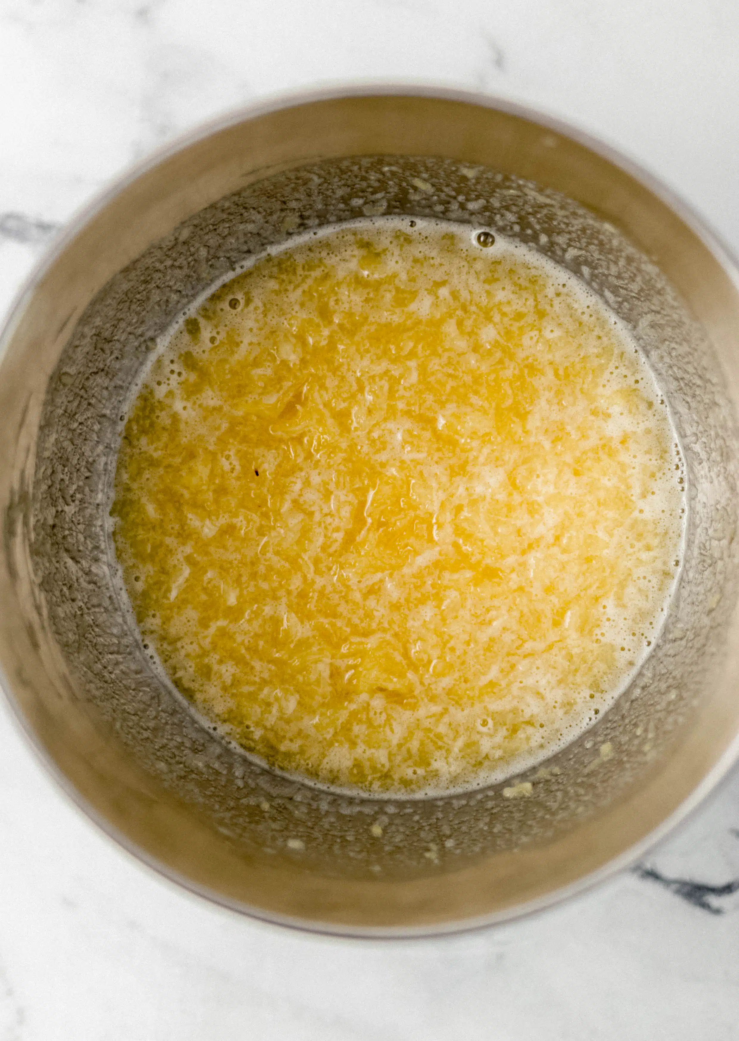 eggs, sugar, pineapple, and vanilla in mixing bowl 
