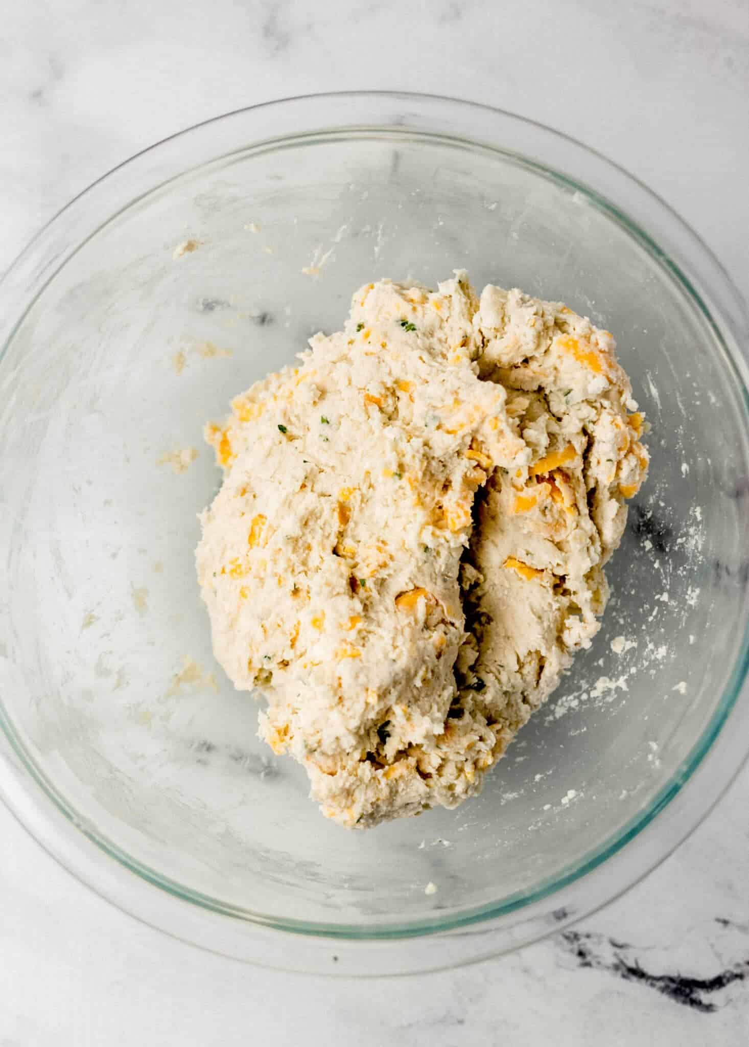 ingredients combined in large glass mixing bowl to form a soft dough.