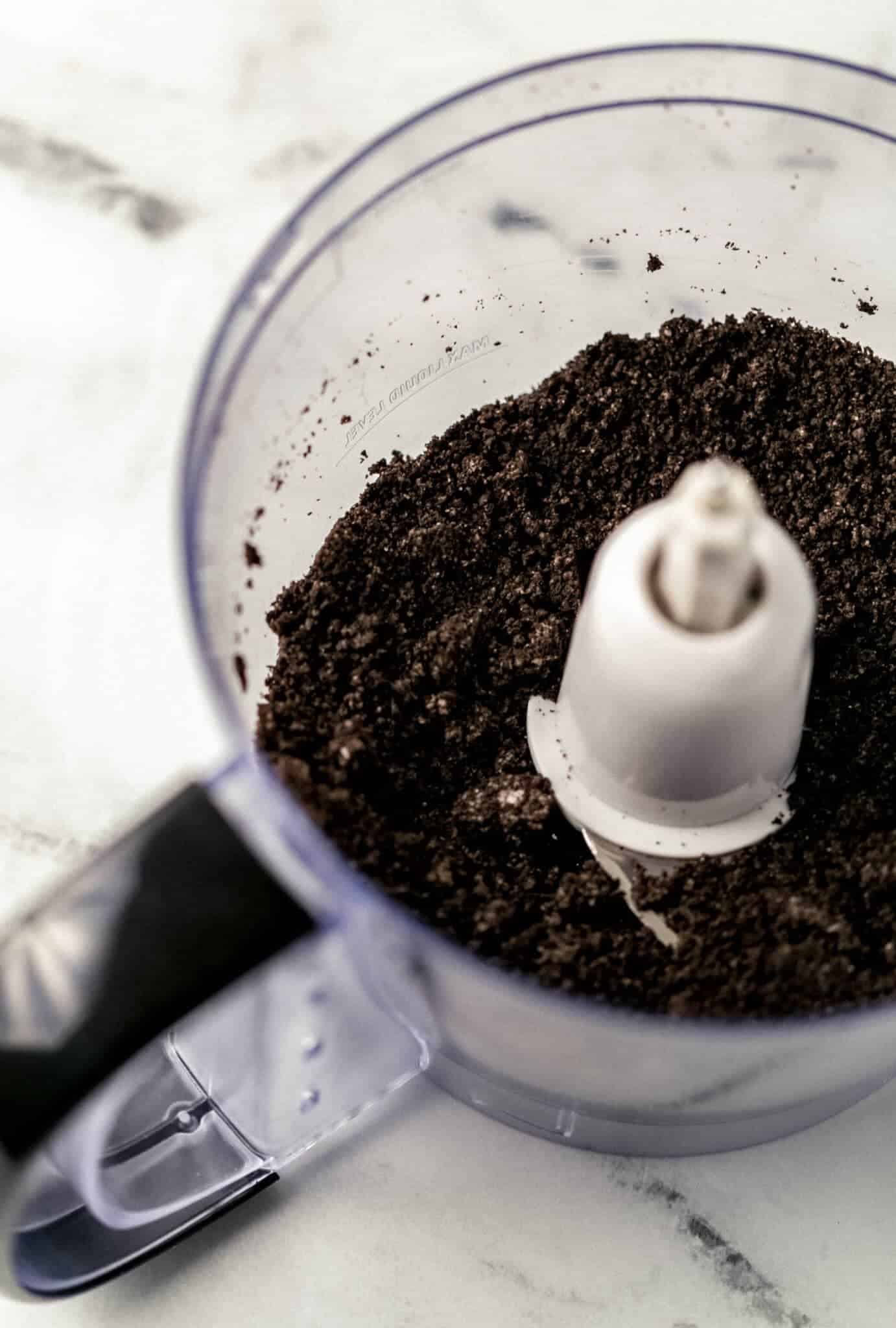 crushed chocolate sandwich cookies in food processor