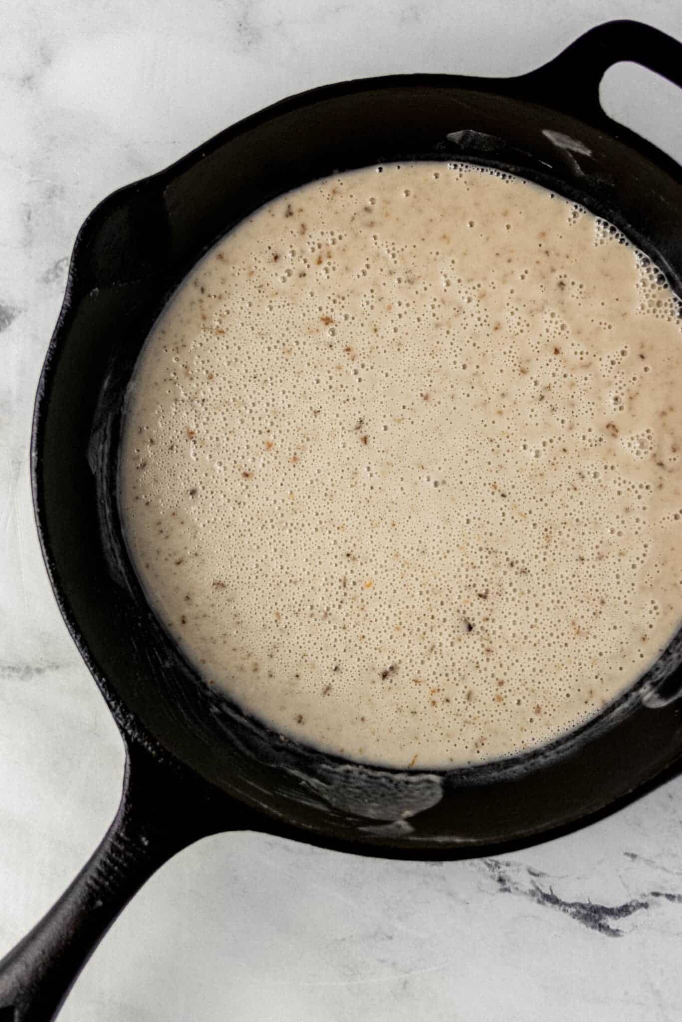 bacon drippings and flour combined in cast iron skillet 