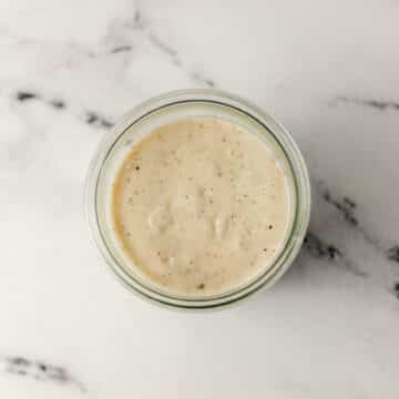 overhead view of finished gravy in glass jar