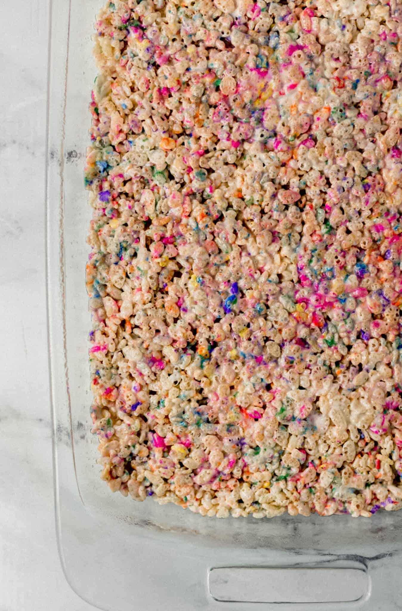 finished rice krispie treats in glass baking dish 